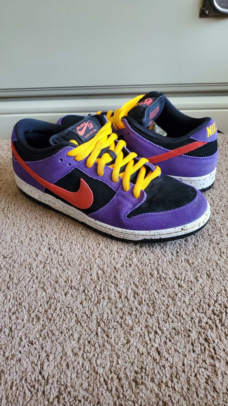nike sb dunk low pro black sunburst varsity purple